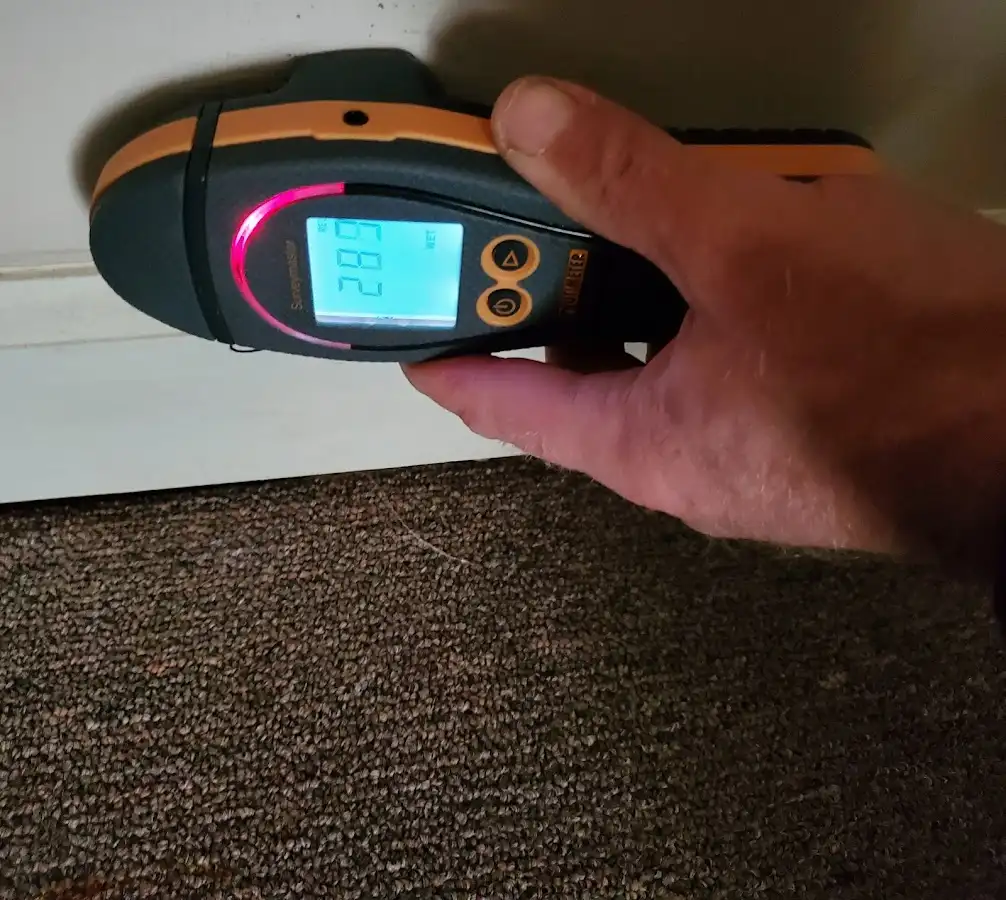 Moisture detection at baseboard during Sewage Cleanup & Sanitation in North Miami Beach